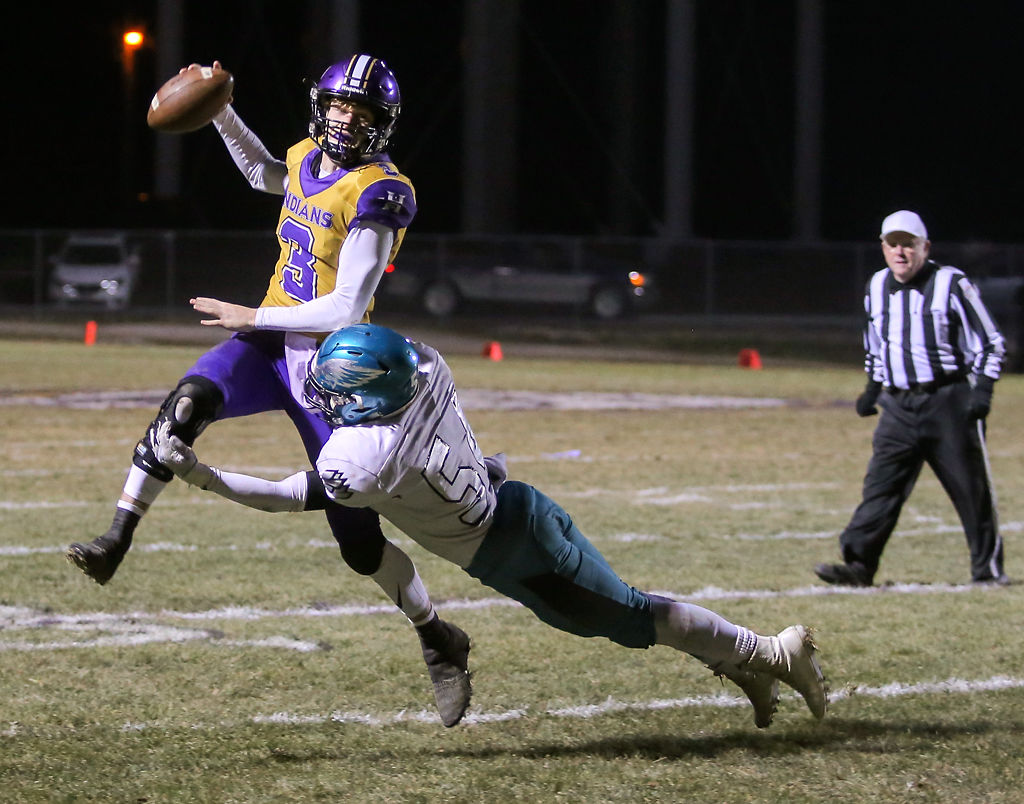Jake Ashburn throws a pass